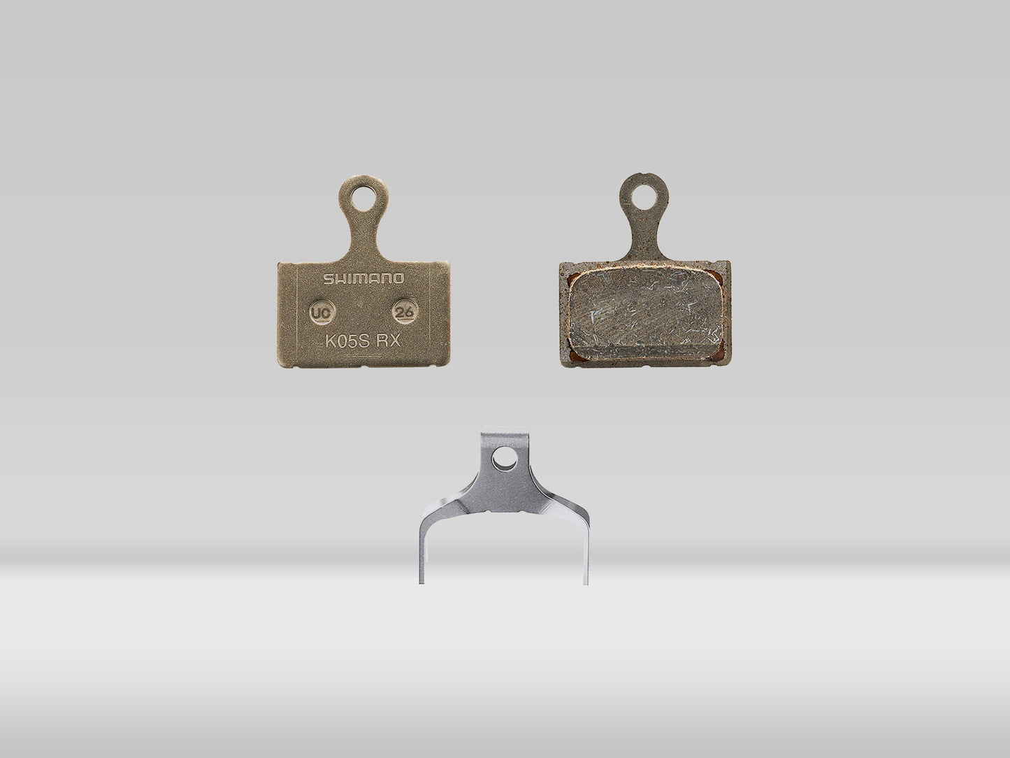 Shimano K05S-RX resinbromsbelägg inkl. fjäder — —