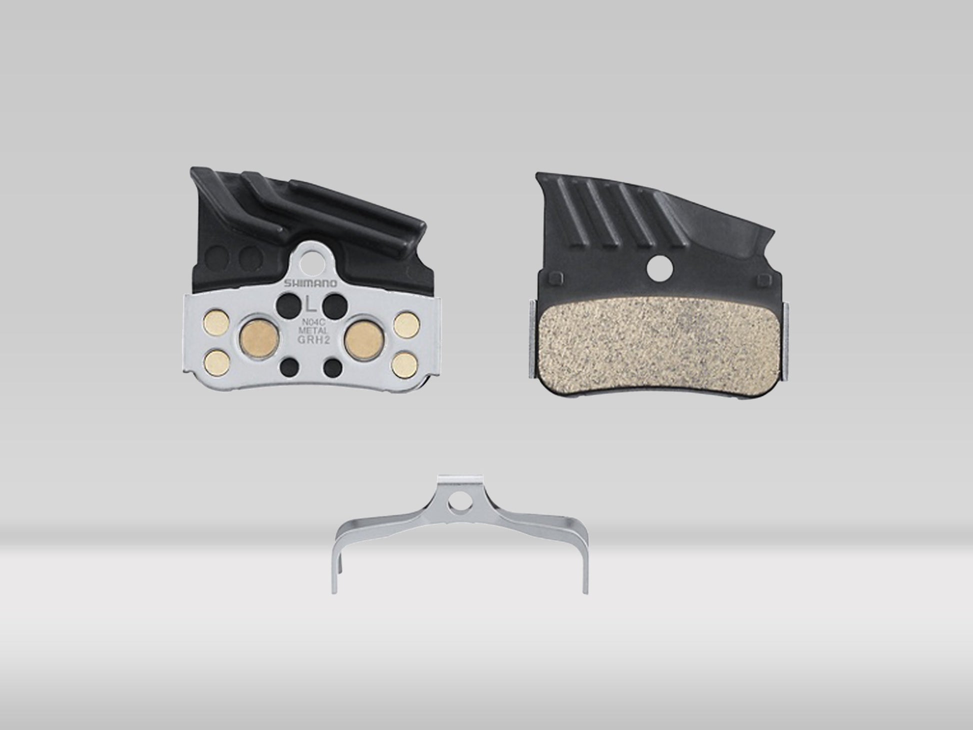 Shimano N04C metallbromsbelägg med kylfläns inkl. fjäder —  —